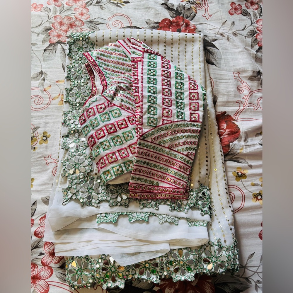 Vibrant Indian white , green and Red Embellished Saree